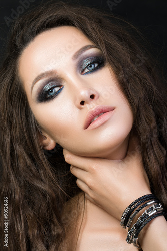 Beauty portrait of young woman with fashion make-up.