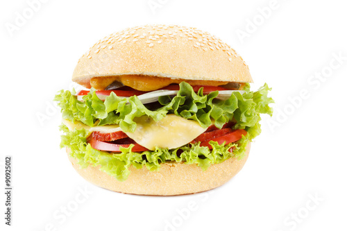Burger with beef and vegetables on white background