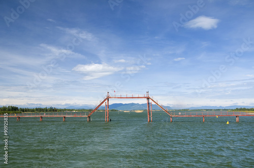 Water bridge across Hoai river, Hoi An ancient town, Danang, Vietnam photo