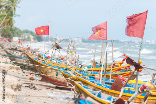 Vietnamese fishing coracles on beach, tribal boats at fishing village