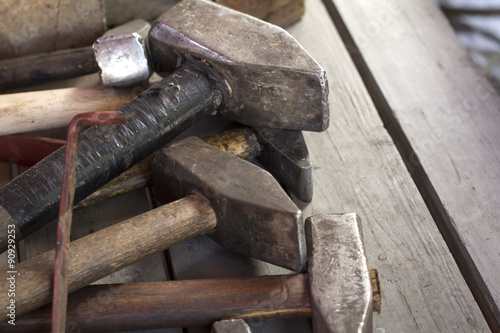 Fotografia, Obraz Different metal worker tools on wooden table