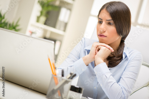 Businesswoman Working On Laptop © milanmarkovic78