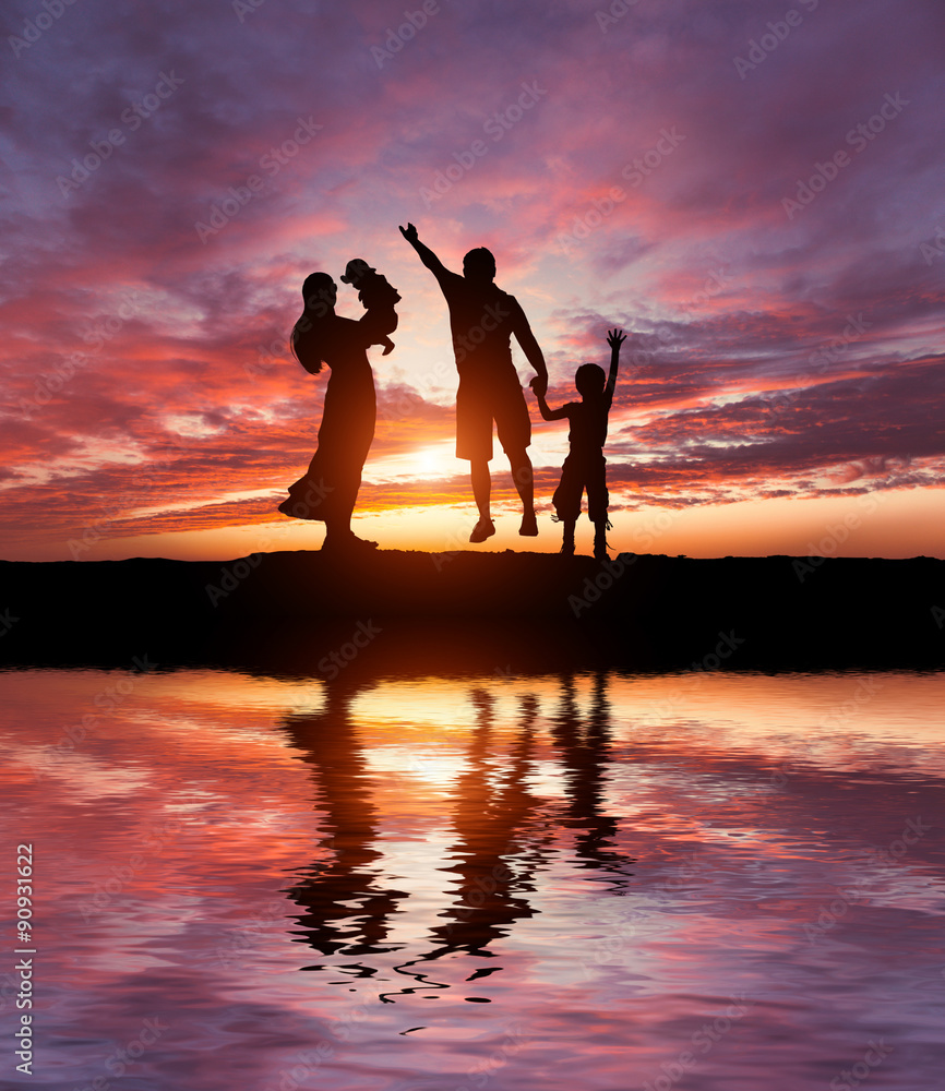 Silhouettes of happy family