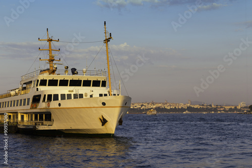 Passenger ship parked on Karakoy pier golden hour times near Golden Horn in Istanbul © tolgaildun