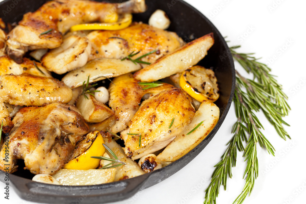 Frying Pan with Roasted chicken thighs. Selective focus. Frying Pan with Roasted chicken thighs. Selective focus.