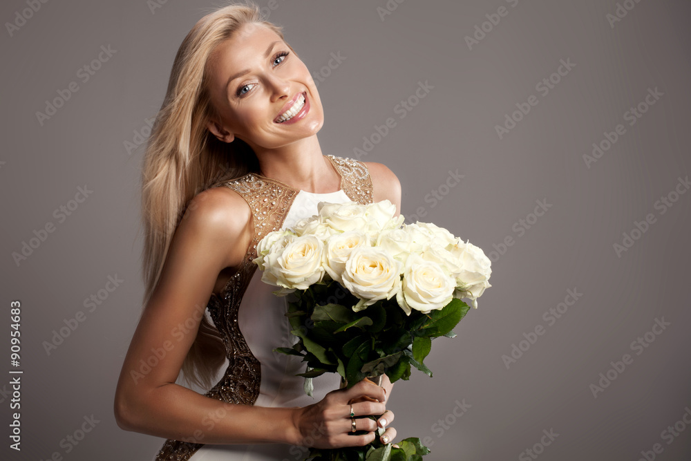 Romantic blonde lady posing in studio. Romantic blonde lady posing in studio.