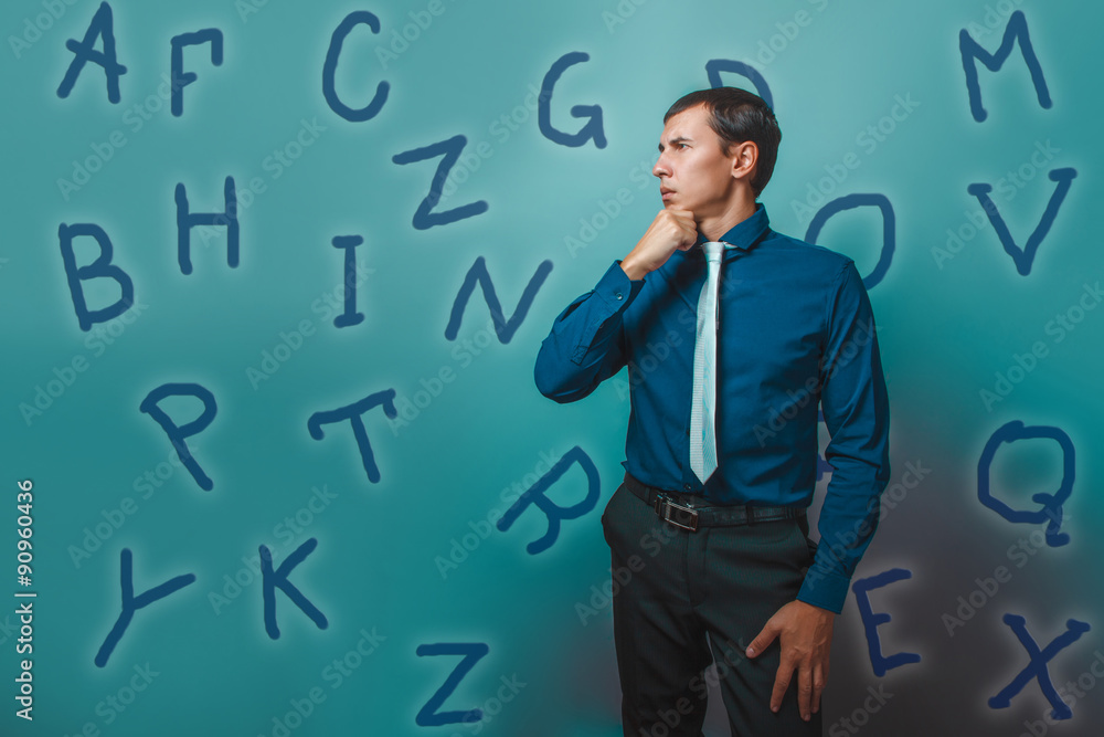 man male teacher businessman thinks alphabet letters looking awa man male teacher businessman thinks alphabet letters looking awa