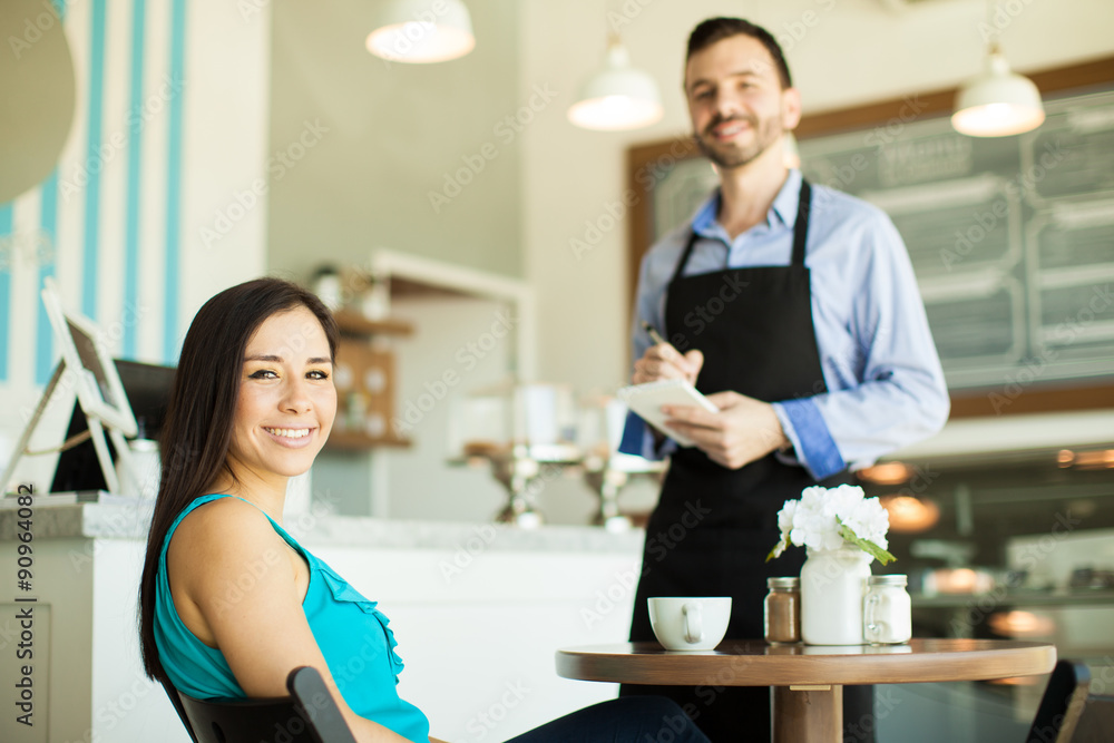 Fototapeta premium Happy customer in a coffee shop