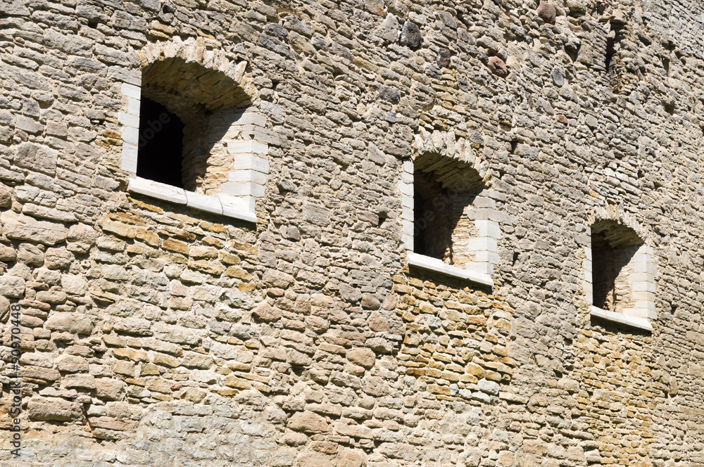 Medieval limestone wall with three windows, Padise Abbey, Estonia
