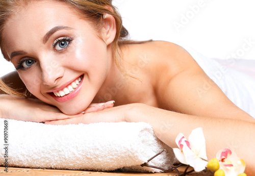 Closeup of an attractive young woman receiving massage