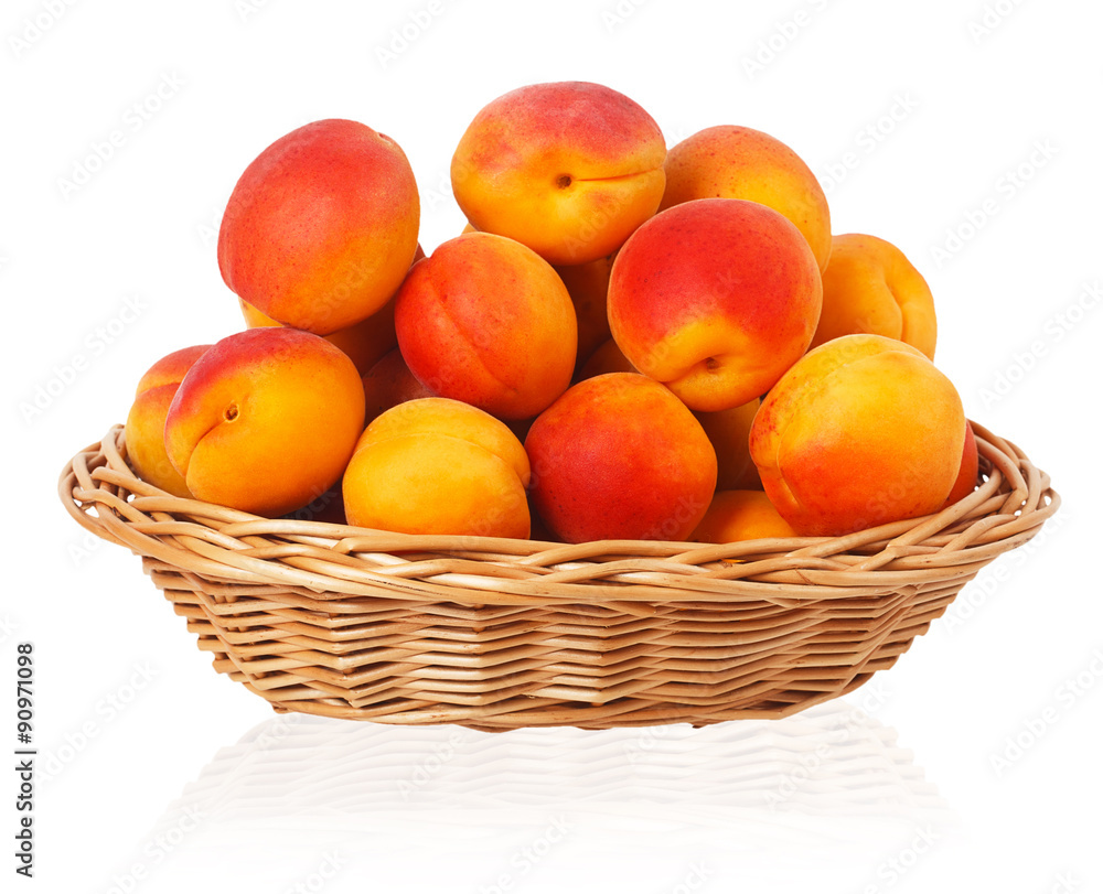 Ripe apricots in a wicker basket Ripe apricots in a wicker basket