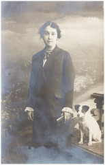 old photo  of  girl with dog