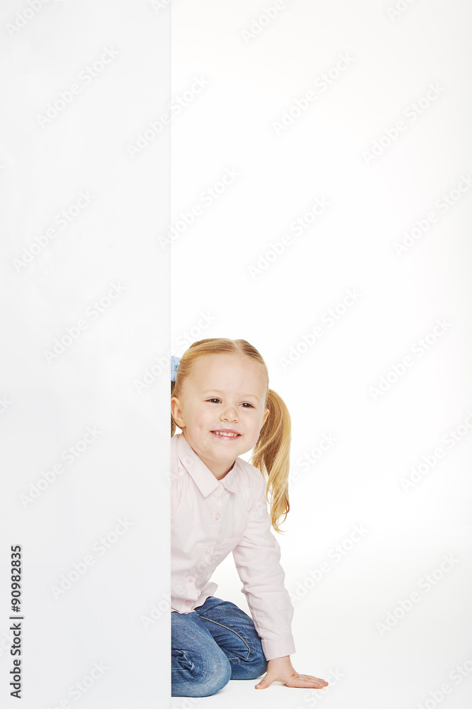 Beautiful little girl with white copy space on a white backgroun Beautiful little girl with white copy space on a white backgroun