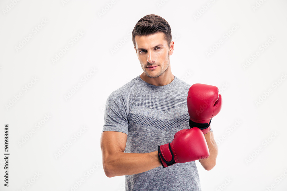 Portrait of a handsome man with boxing gloves