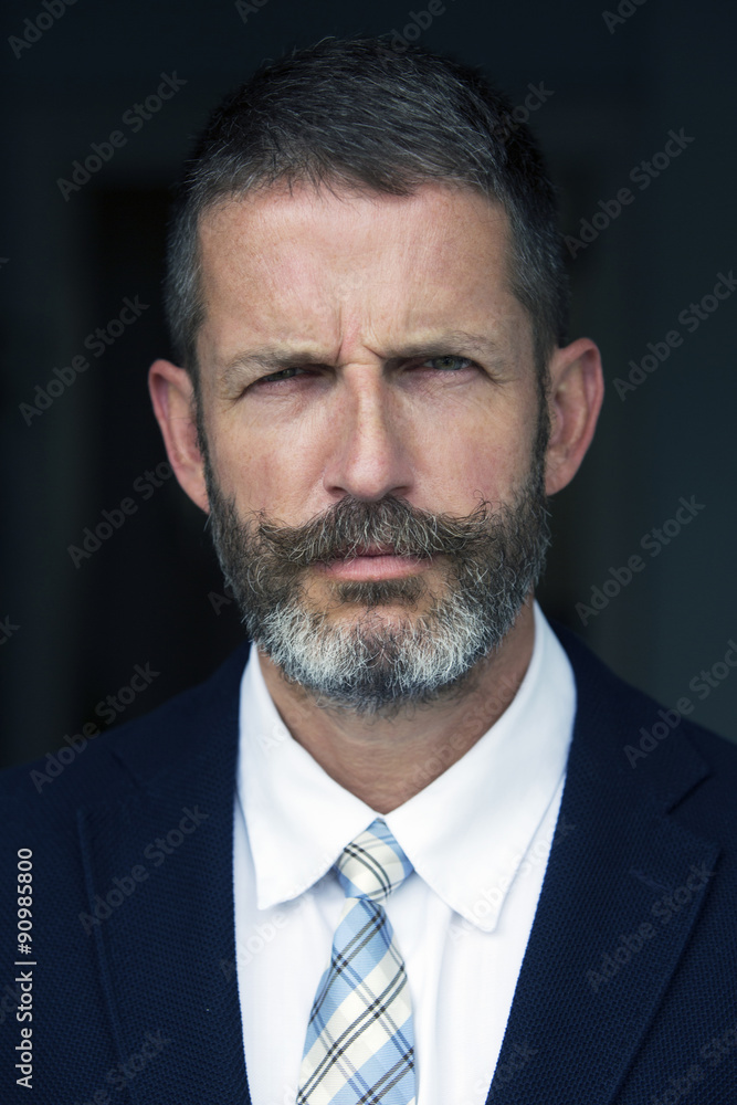 portrait of handsome businessman looking angry portrait of handsome businessman looking angry