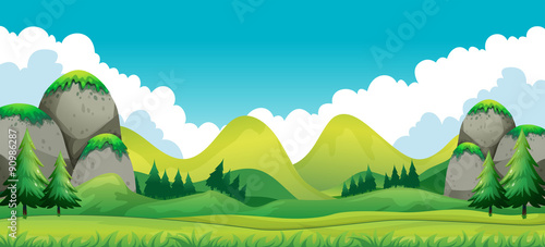 Scene of green field with mountains background