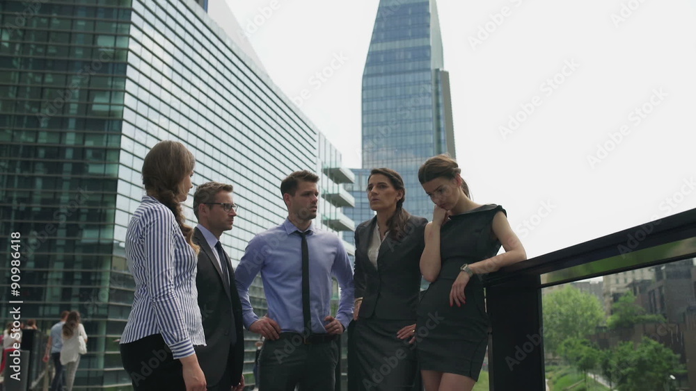 Upset businesspeople looking to the camera, steadycam shot
Upset businesspeople looking to the camera, steadycam shot