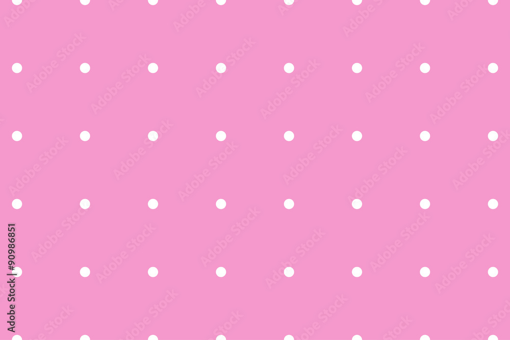 White polka dots pattern on pink background
