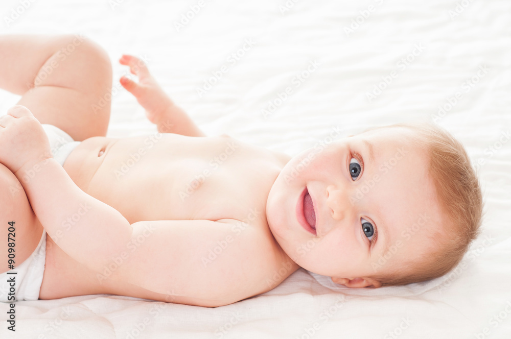 Beautiful happy baby. One, isolated on white. Laughing baby. Beautiful happy baby. One, isolated on white. Laughing baby.