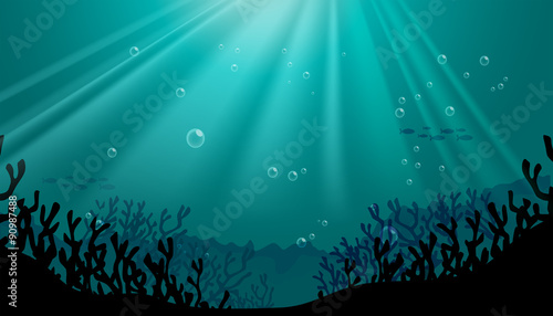 Silhouette underwater scene with coral reef