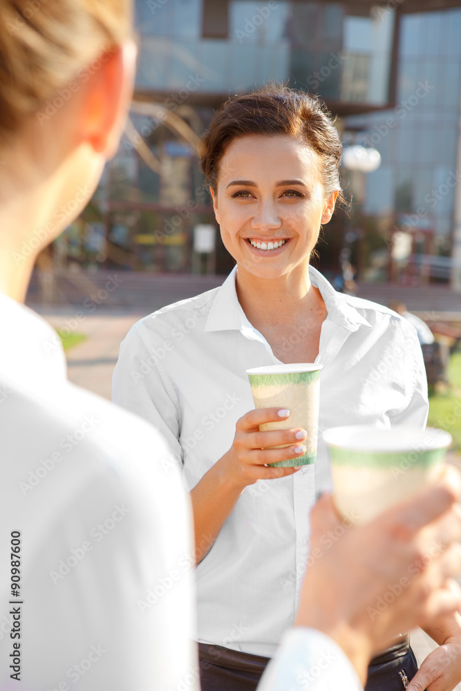 Two businesswoman having a coffee break Two businesswoman having a coffee break