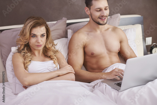 Canvas Print He is a workaholic and she is simply angry