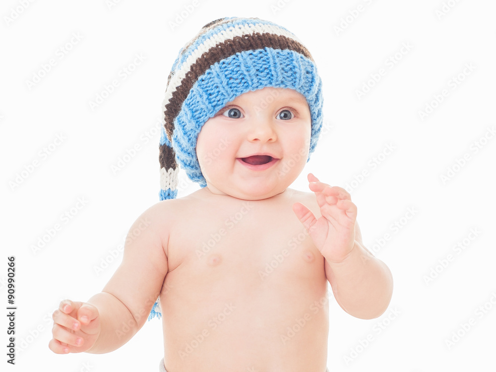 cheerful baby in the blue hat. Beautiful happy baby . One,isolat cheerful baby in the blue hat. Beautiful happy baby . One,isolat