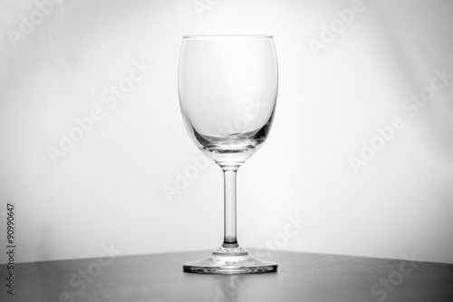 Wine glass placed on white background.