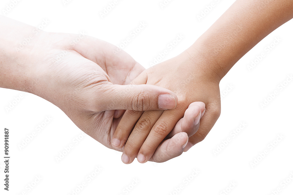 Hands of father and son holding each other Hands of father and son holding each other