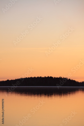 Serene lake scape at dusk