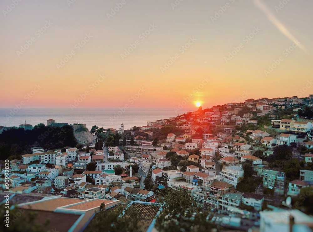 Sunset over sea and Montenegro town