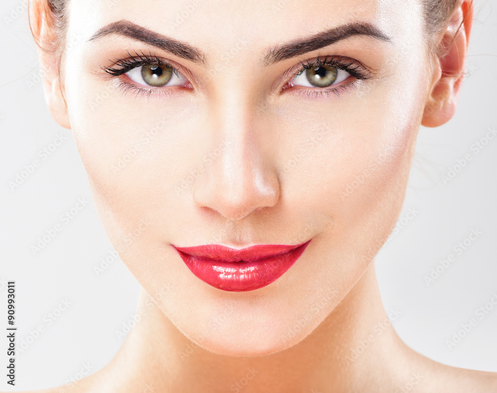 Beautiful face of young adult woman with clean fresh skin. Looki Beautiful face of young adult woman with clean fresh skin. Looki