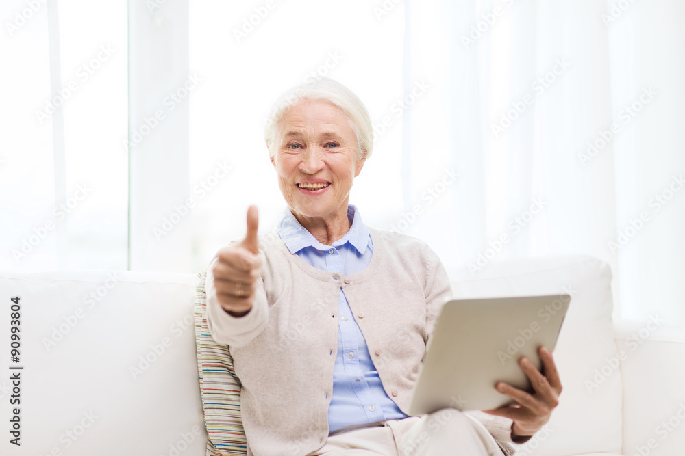 senior woman with tablet pc showing thumbs up senior woman with tablet pc showing thumbs up