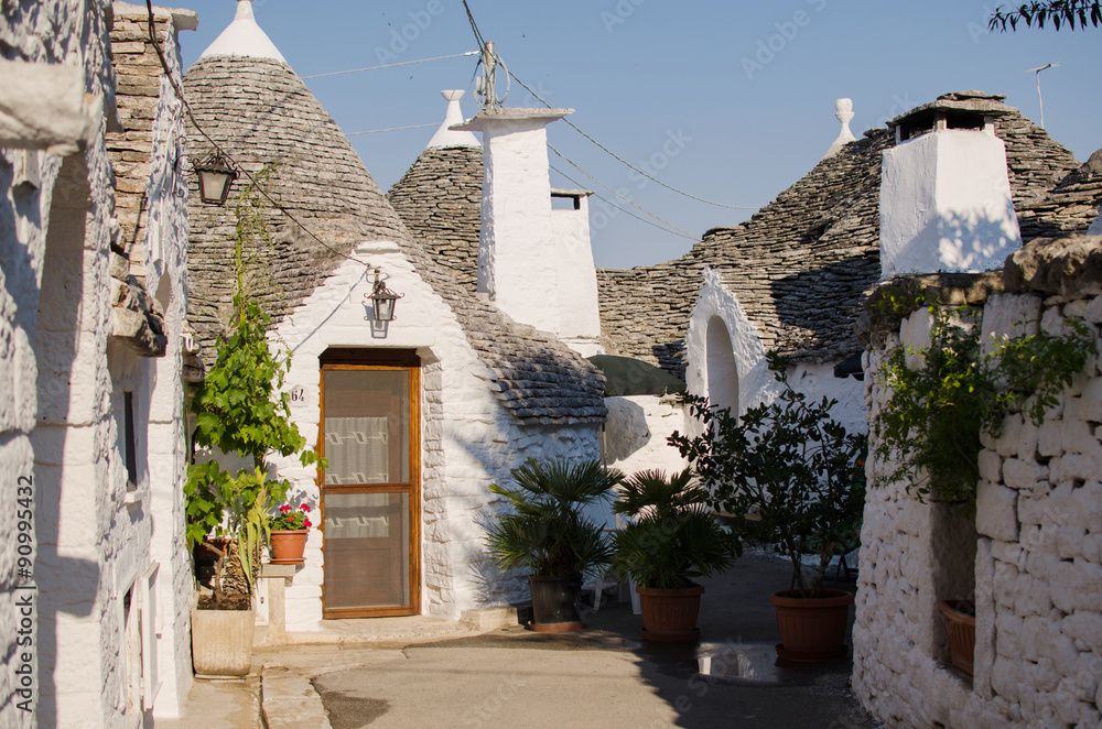 Unique trulli houses with conical roofs. Alberobello.