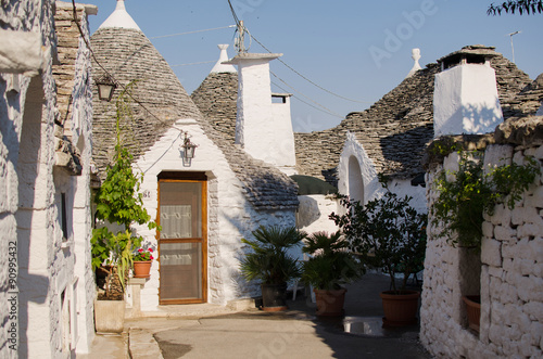 Unique trulli houses with conical roofs. Alberobello.