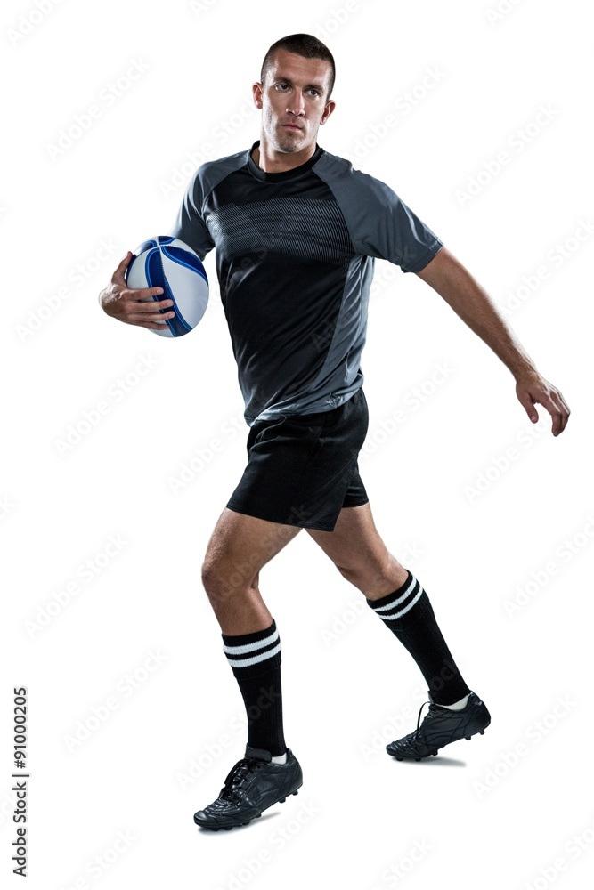 Sportsman running with ball