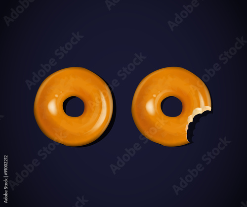 Donut and donut with a mouth bite isolated on dark background (teeth) photo