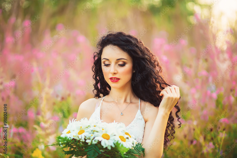 Naklejka premium Beautiful girl on the lavender field