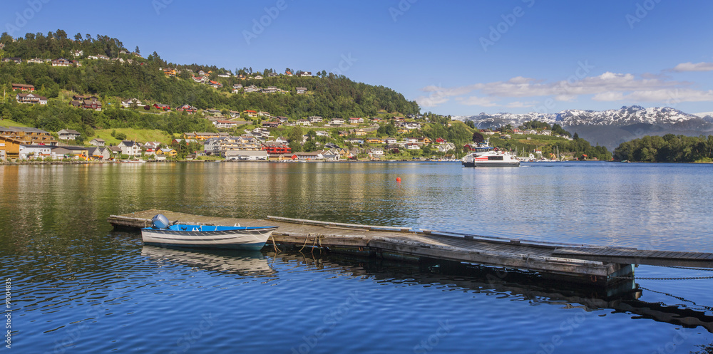 Fototapeta premium Meadows and village on norvegian fiords