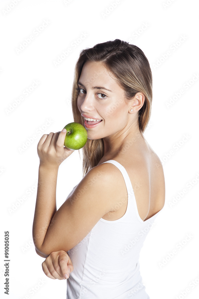 Smiling beauty holding green apple while isolated on white Smiling beauty holding green apple while isolated on white