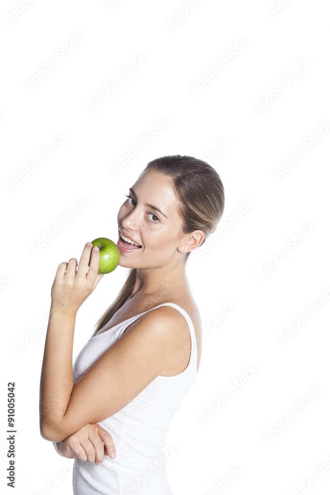 Smiling beauty holding green apple while isolated on white Smiling beauty holding green apple while isolated on white