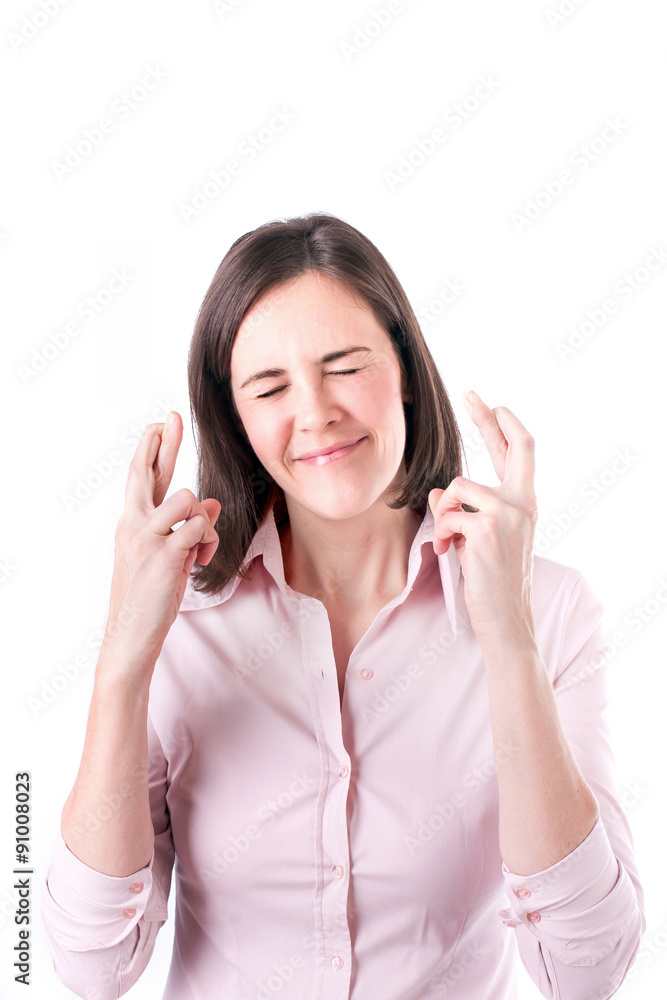 Young businesswoman making a wish, isolated on white background. Young businesswoman making a wish, isolated on white background.