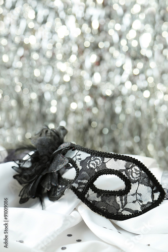 Female carnival mask with bokeh