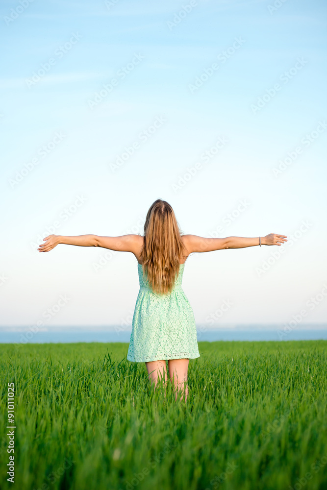 Happiness woman stay outdoor under sunlight of sunset Happiness woman stay outdoor under sunlight of sunset