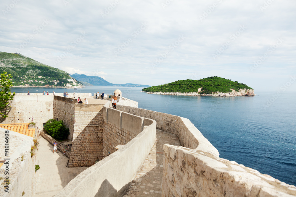 Dubrovnik, Croatia - May 25, 2012 : Tourists walking around the fortress of Dubrovnik at the afternoon