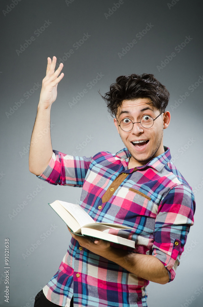 Funny student with many books