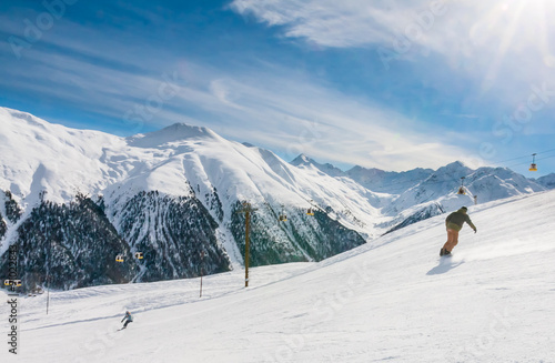 Skiers on the slope of  Ski resort Livigno. Italy