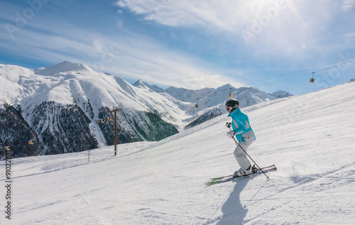 Skier on the slope of  Ski resort Livigno. Italy photo