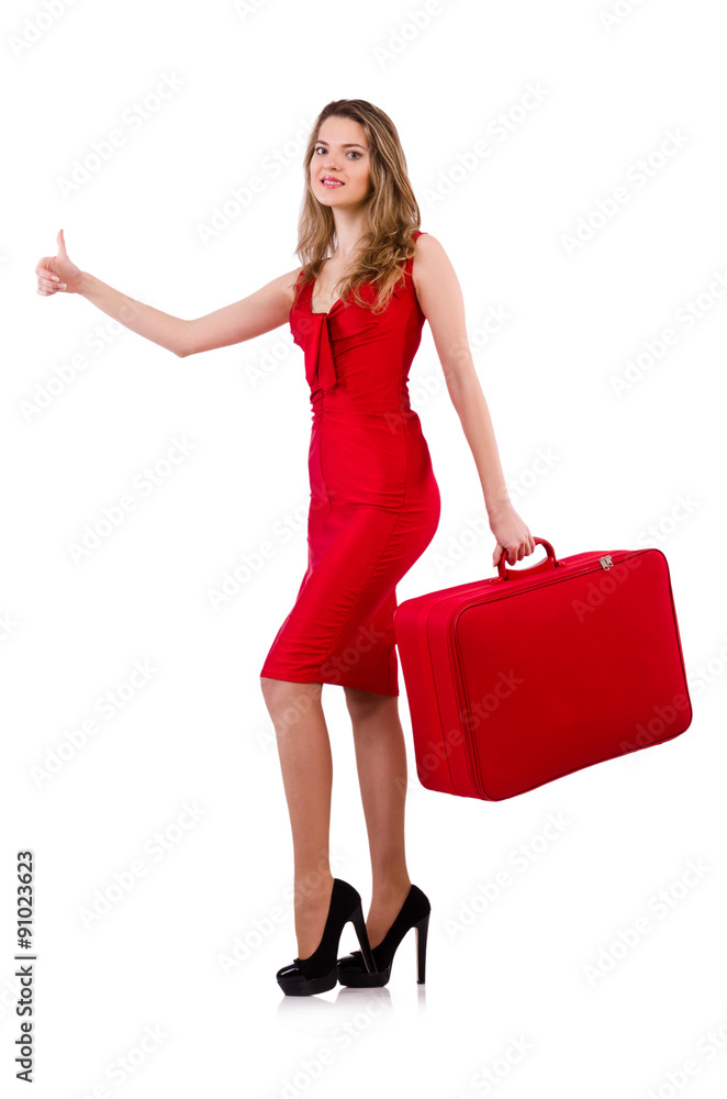 Hitchhiker woman in red dress with suitcase isolated on white Hitchhiker woman in red dress with suitcase isolated on white