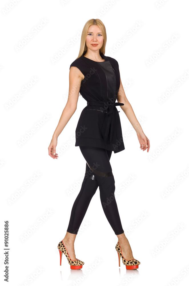 Fototapeta premium Pretty woman in tight black pants isolated on white